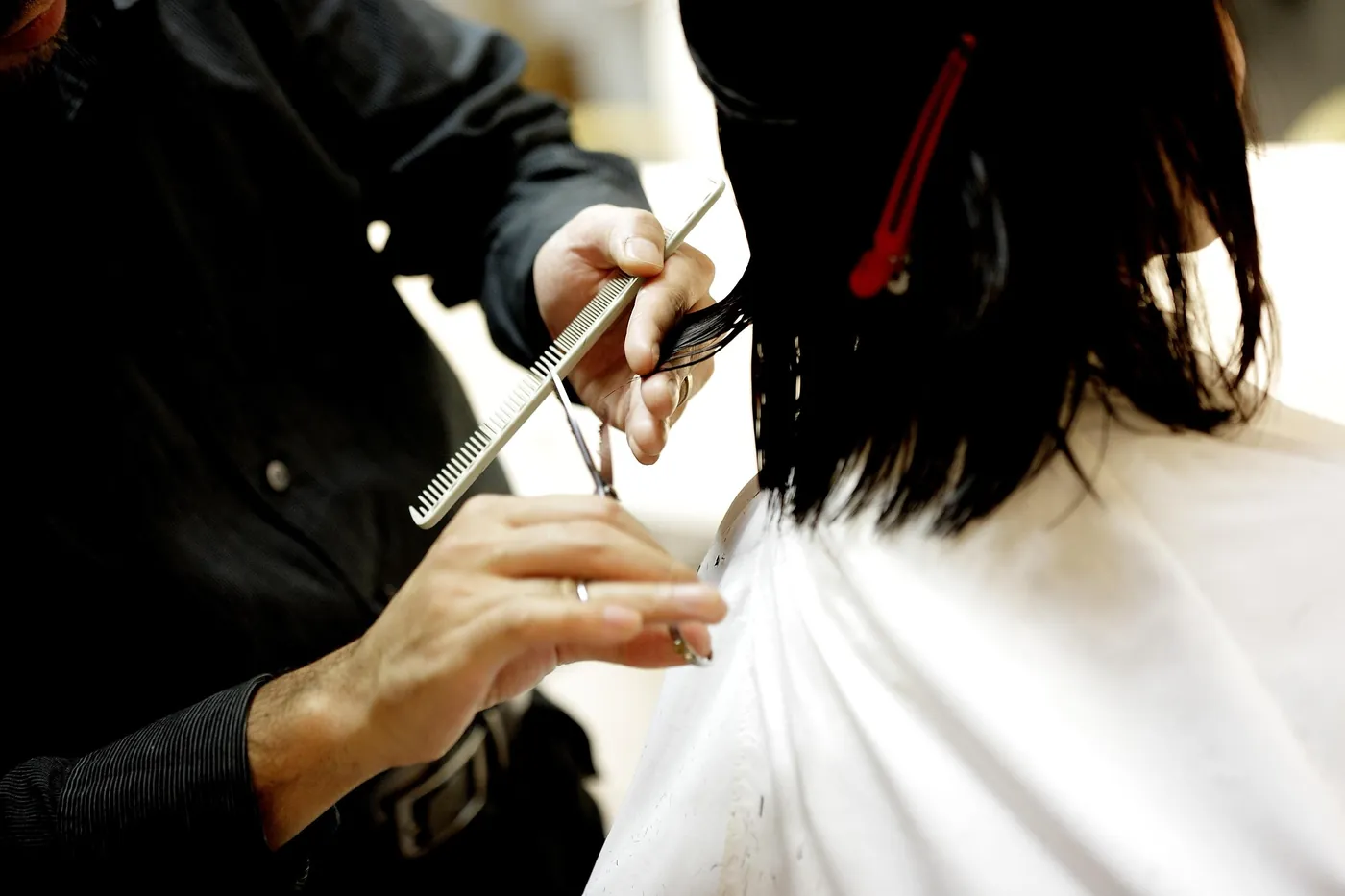 Coupe réalisée par un professionnel de la coiffure